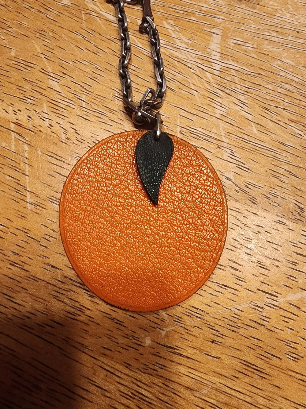 authentic Hermès orange fruit leather bag charm and keychain